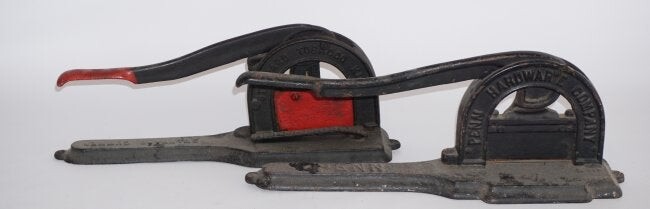 Two Antique CI Advertising Tobacco Plug Cutters