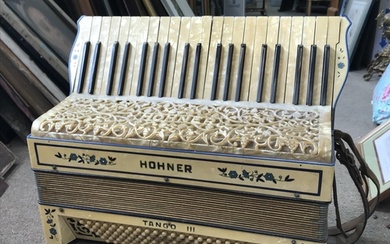 Two Hohner accordions including a Hohner Tango III and a cas...