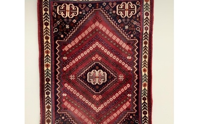 Two Persian red ground rugs, larger 148 x 102cm