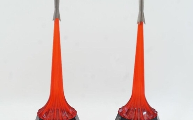 Two Russian 'Sputnik' night lights, 1970s, modelled as rockets taking off with scarce red perspex vapour trail, atop plastic and perspex dodecagonal bases decorated with celebrations of Soviet Union achievements, both approximately 37cm high (2) It...