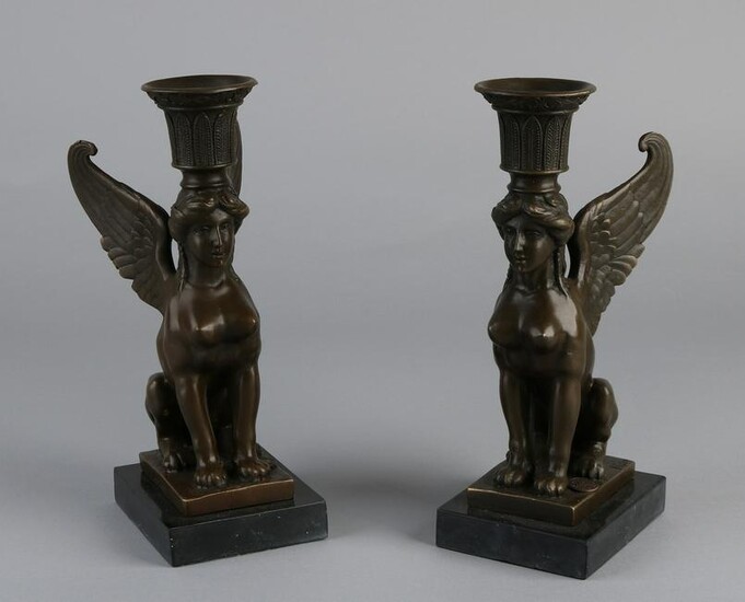 Two bronze Empire style candle holders with caryatids