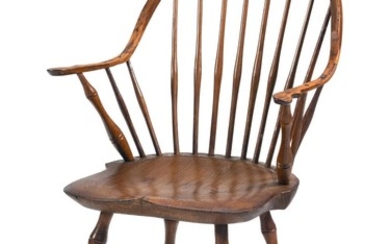 WINDSOR CONTINUOUS ARMCHAIR In ash and maple. Back height 34.25". Seat height 16.5".