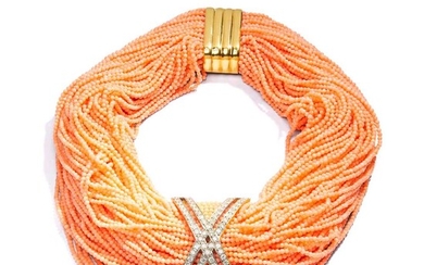 Y A coral and diamond-set necklace