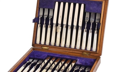 Y An Edwardian set of twelve silver and mother of pearl fruit knives and forks