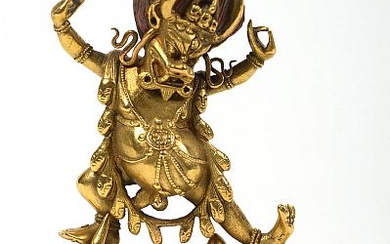 "Yama" en bronze doré portant des traces de polychromie. Travail sino-tibétain. Epoque : XVIIIème. (Micro manque à un doigt). H.:+/-11,5cm.