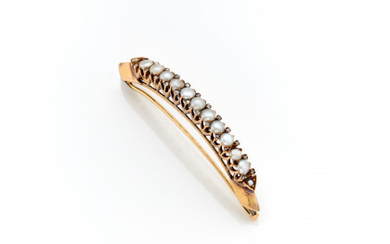 Yellow 14K gold brooch with half pearls and rose cut diamonds, g 6.12 circa, length cm 5.20 circa. (defects and...