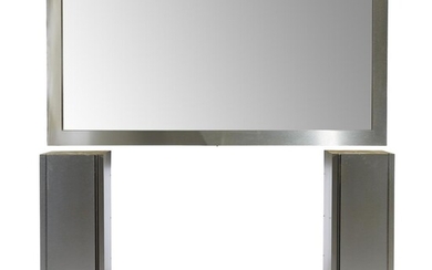 A chrome vanity mirror and pair of wall-mounted cabinets...