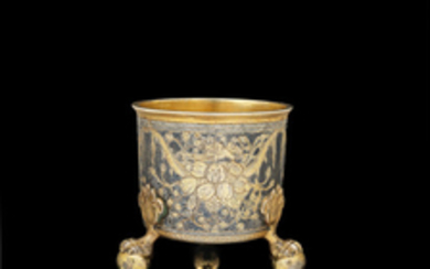 A Russian parcel-gilt silver and niello cup