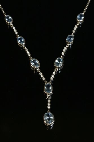 A white gold aquamarine and diamond necklace