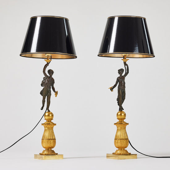 2765023. TABLE LAMPS, a pair, Louis-Phillipe, France first half of the 19th century, paired, matted and polished burnished gilt and dark patinated bronze.