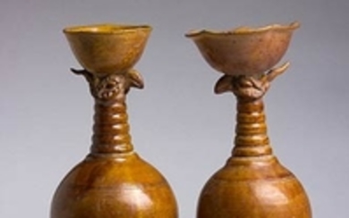 A PAIR OF AMBER-GLAZED INCISED ‘PHOENIX HEAD’ VASES Liao dynasty...