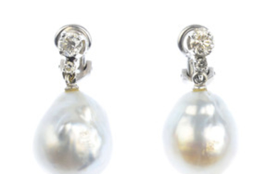 A pair of cultured pearl and diamond earrings. View more details