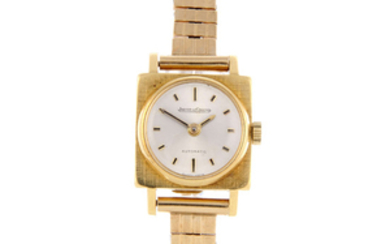 JAEGER-LECOULTRE - a lady's 18ct yellow gold bracelet watch.