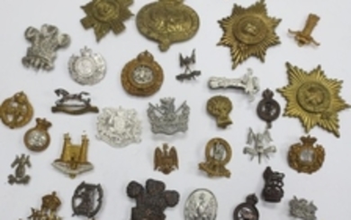 A Group Of Various British Military Cap And Collar Badges