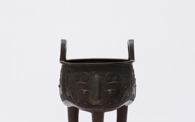 An archaistic bronze tripod censer, ding