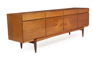 Ib Kofod-Larsen: Brazilian rosewood sideboard, front with four drawers and four doors. Manufactured by Faarup Møbelfabrik. H. 77. W. 230. D. 50 cm.