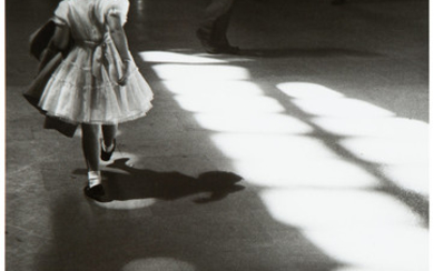 Louis Stettner (1922-2016), Young Girl Playing in Light Circles, Penn Station, New York City (1958)