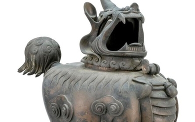LARGE CHINESE BRONZE FIGURAL COVERED CENSER In the form of a guardian fu lion with a fierce expression. Separate head-form cover. Ta...