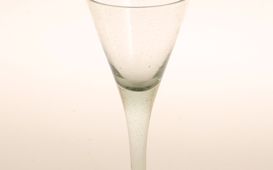 A 18th-century green-tinted wine glass.