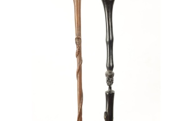 A 19TH CENTURY AFRICAN HARDWOOD WALKING STICK with carved bu...
