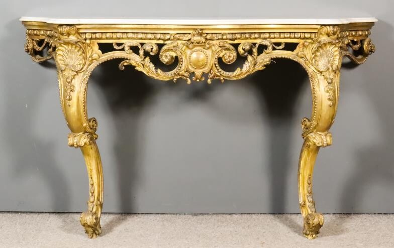 A 19th Century French Gilt Console Table of Bold...