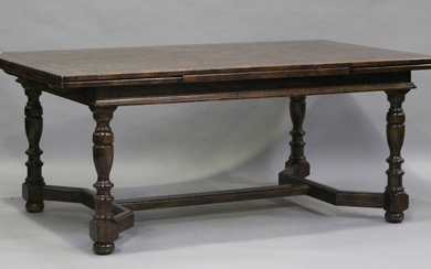 A 20th century oak draw-leaf dining table with parquetry top, on turned baluster legs, height 77cm
