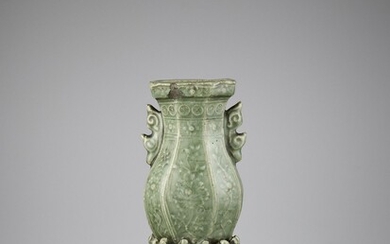 A CARVED LONGQUAN WALL VASE, MING