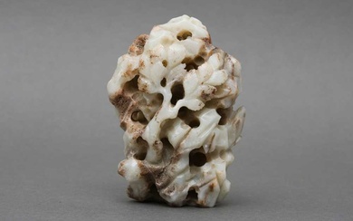 A CHINESE CARVED 'DRAGON AMONG MOUNTAINS' JADE 寮至元 玉雕龍山