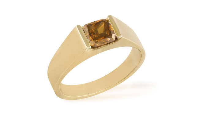 A COLOURED DIAMOND SINGLE-STONE RING The cushion-shaped diamond...