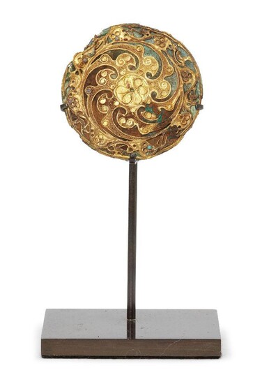 A Chinese bronze and gold circular plaque, Eastern Han dynasty,...