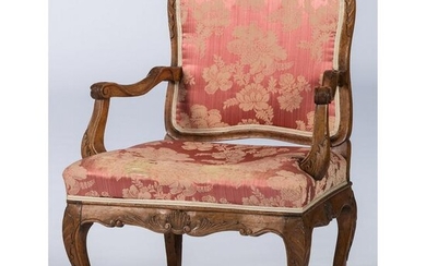 A Continental Fruitwood Fauteuil with Spanish Feet