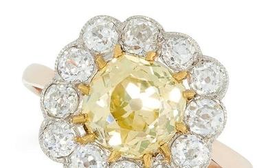 A FANCY YELLOW DIAMOND CLUSTER RING in yellow gold, set
