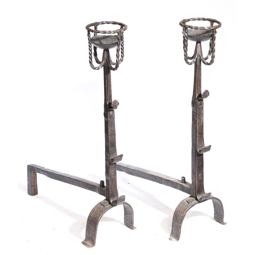 A GOOD PAIR OF 17TH CENTURY STYLE IRON CRESSET FIREDOGS. Eac...