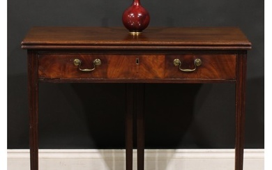 A George III mahogany tea table, hinged top above a long fri...