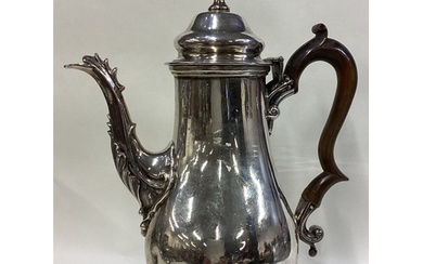 A George III silver coffee pot. Marked to base. London 1756....
