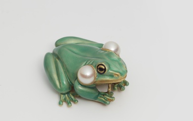 A German one of a kind 18k gold enamel and pearl frog with sound bubbles.