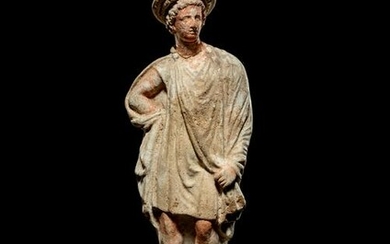 A Greek Painted Terra Cotta Male Figure