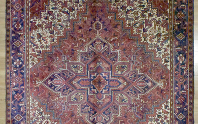 A HANDKNOTTED PURE WOOL PERSIAN HEREZ RUG