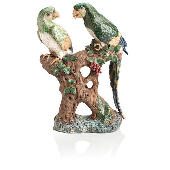A JAPANESE STONEWARE FIGURE GROUP OF PARROTS