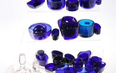 A LARGE QUANTITY OF PREDOMINANTLY BLUE GLASS LINERS