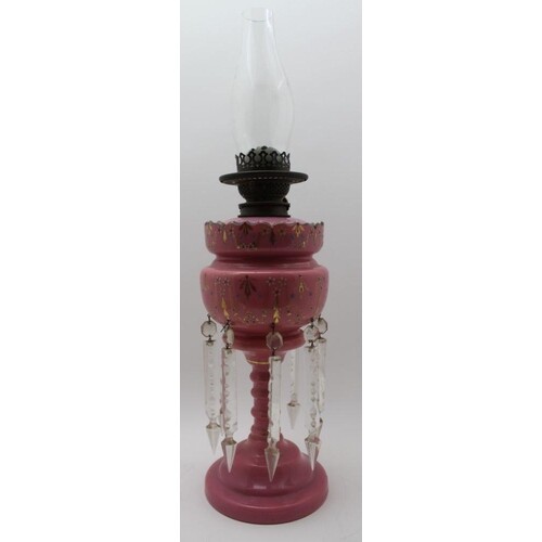 A LATE VICTORIAN PINK GLASS LUSTRE MOUNTED OIL LAMP 36.5cm h...