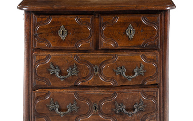 A Louis XV/XVI Provincial Walnut Chest of Drawers