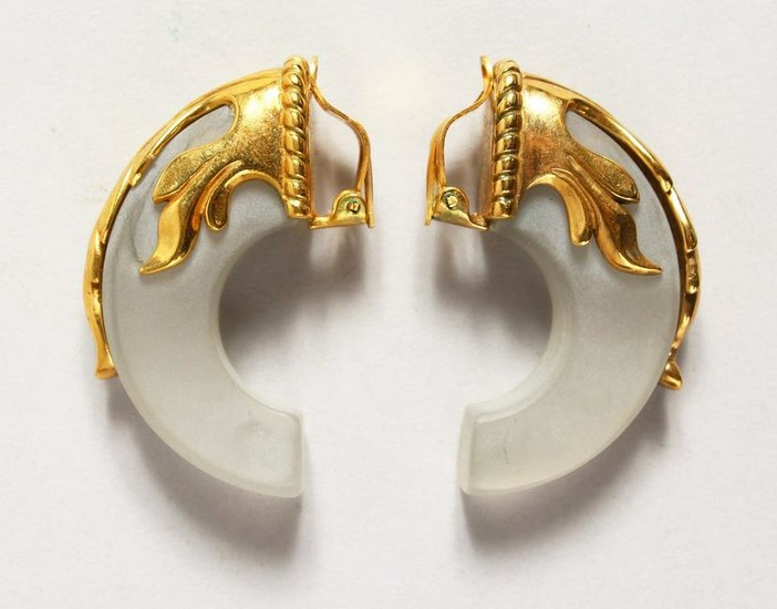 A PAIR OF CRYSTAL AND SILVER GILT EAR CLIPS shaped as