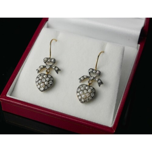 A PAIR OF HEART DROP EARRINGS WITH BOW TOPS SET WITH DIAMOND...