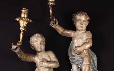 A Pair of Late 17th/Early 18th Century Carved & Polychromed Wooden Putti; Each swagged with a blue c
