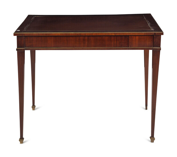 A Russian or Baltic Neoclassical Brass Mounted Mahogany Four-Drawer Table