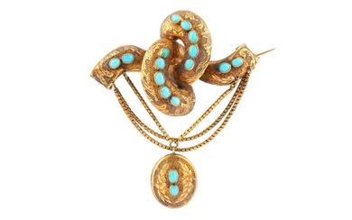 A TURQUOISE LOCKET BROOCH
