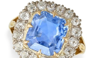 A VINTAGE SAPPHIRE AND DIAMOND CLUSTER RING in 18ct yellow and white gold, set with an octagonal