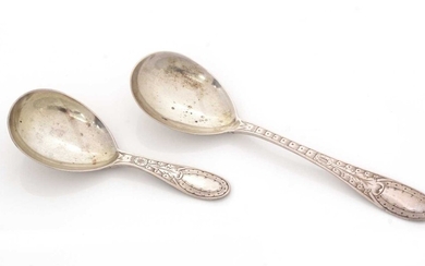 A Victorian silver Provincial caddy spoon and matching sugar spoon.