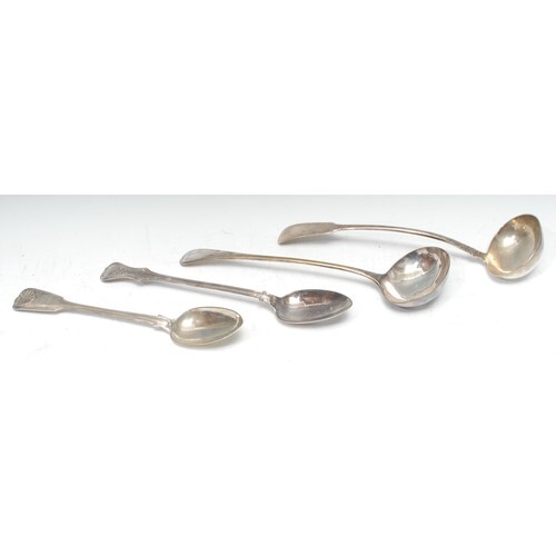 A Victorian silver Shell and Fiddle pattern serving spoon, G...